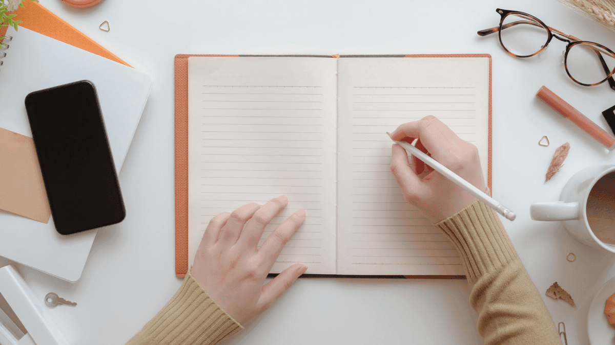 a writer with a pen in his hand