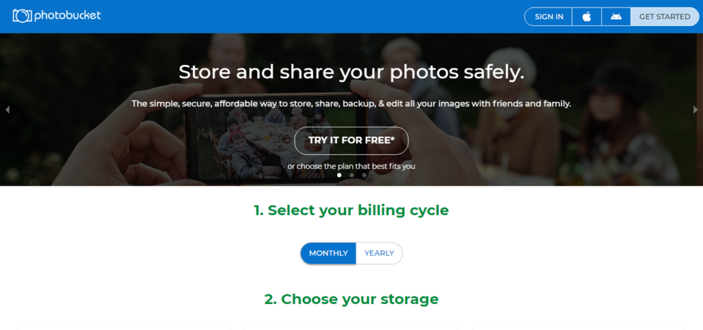 Photobucket The safer way to store your photos - CyberNaira A professional screenshot of the Photobucket homepage featuring the headline "Store and share your photos safely." The hero section shows a person holding a smartphone displaying a group dinner photo, with a "TRY IT FOR FREE*" call-to-action button. Below this, a multi-step registration process begins with "1. Select your billing cycle," showing a toggle for Monthly or Yearly payments, followed by "2. Choose your storage." The top navigation bar is deep blue with a "GET STARTED" button and icons for Apple and Android mobile apps.