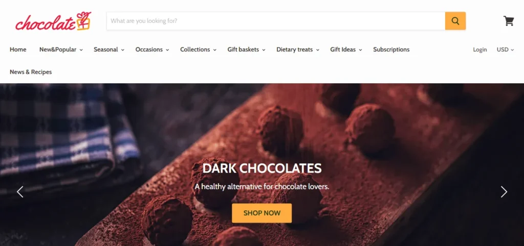 Chocolate.com homepage banner featuring cocoa-dusted dark chocolate truffles and a Shop Now button.