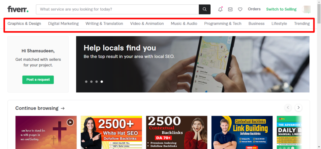 Fiverr Freelance Services Marketplace - CyberNaira A screenshot of the Fiverr homepage for a logged-in user named Shamsudeen. The top of the page features a search bar and a main navigation menu, highlighted with a red box, containing service categories like Graphics & Design, Digital Marketing, Writing & Translation, and Programming & Tech. A sidebar on the left includes a "Post a request" button, while the main content area shows a "Help locals find you" banner for local SEO services. The bottom section, titled "Continue browsing," displays several gig thumbnails for SEO and link-building services.