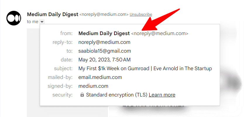 A screenshot of an email header details showing sender and recipient information. The email is from "Medium Daily Digest noreply@medium.com" with a red arrow pointing to this sender information. The email details show:From: Medium Daily Digest noreply@medium.com
Reply-to: noreply@medium.com
To: saabiola15@gmail.com
Date: May 20, 2023, 7:50 AM
Subject: My First $1k Week on Gumroad | Eve Arnold in The Startup
Mailed-by: email.medium.com
Signed-by: medium.com
Security: Standard encryption (TLS) with a "Learn more" link
The Medium logo (a circular black icon with "M" inside) appears in the top left corner, and there's an "Unsubscribe" link visible.