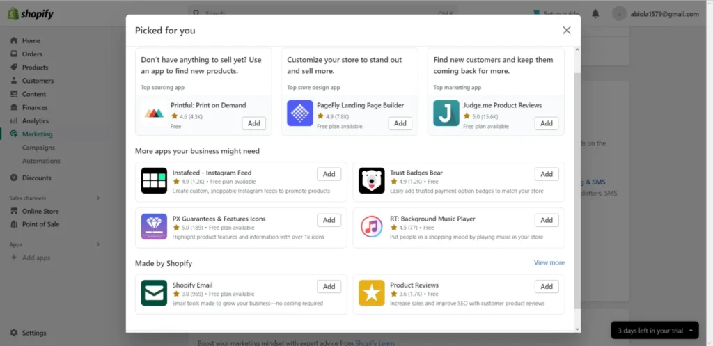 Shopify app store popup showing recommended apps like Printful, PageFly, Judge.me, and Shopify Email.