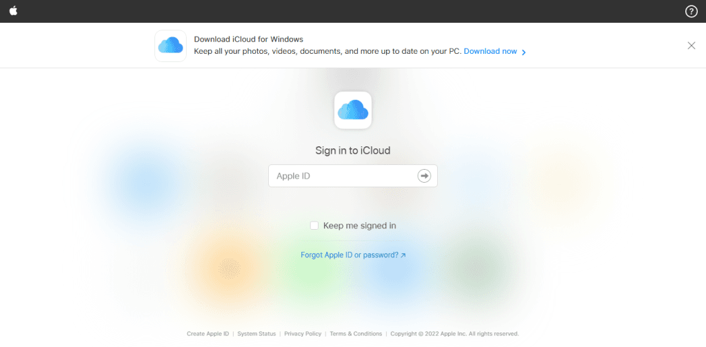 Apple iCloud sign in page with Apple ID field and a banner to download iCloud for Windows.